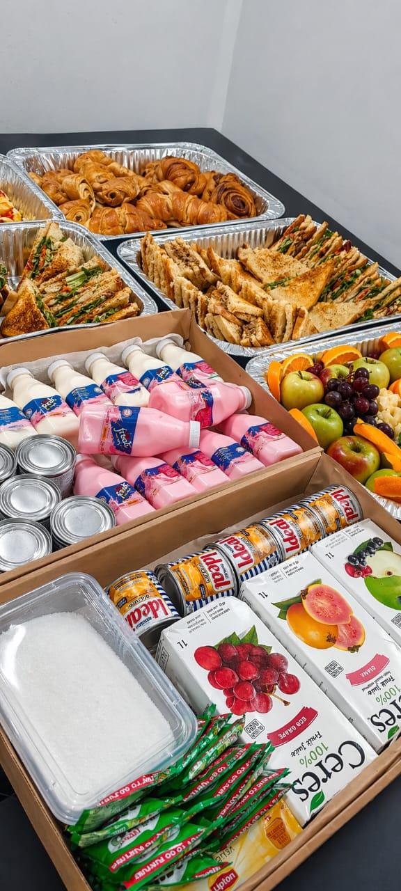 Breakfast platter with pastries and juice