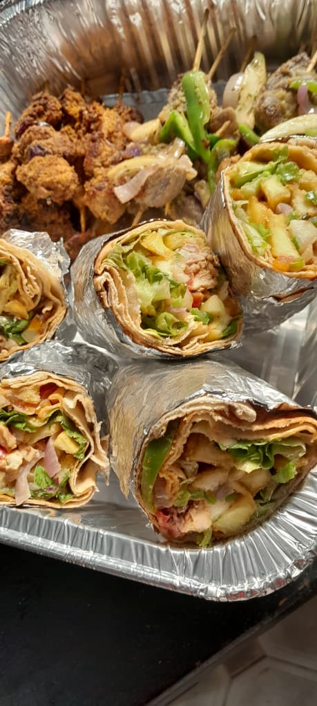 Finger food platter — wraps and skewers